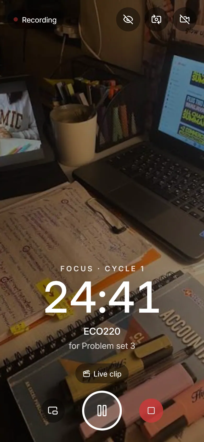 On a phone, a recording session is the camera: the desk, with the timer over it
